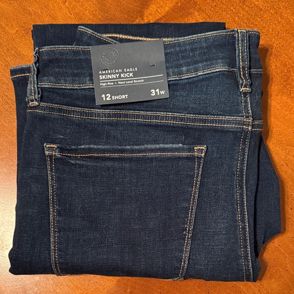 AE Next Level High-Waisted Skinny Kick Jean Dark Shadow 12 Short 31w
